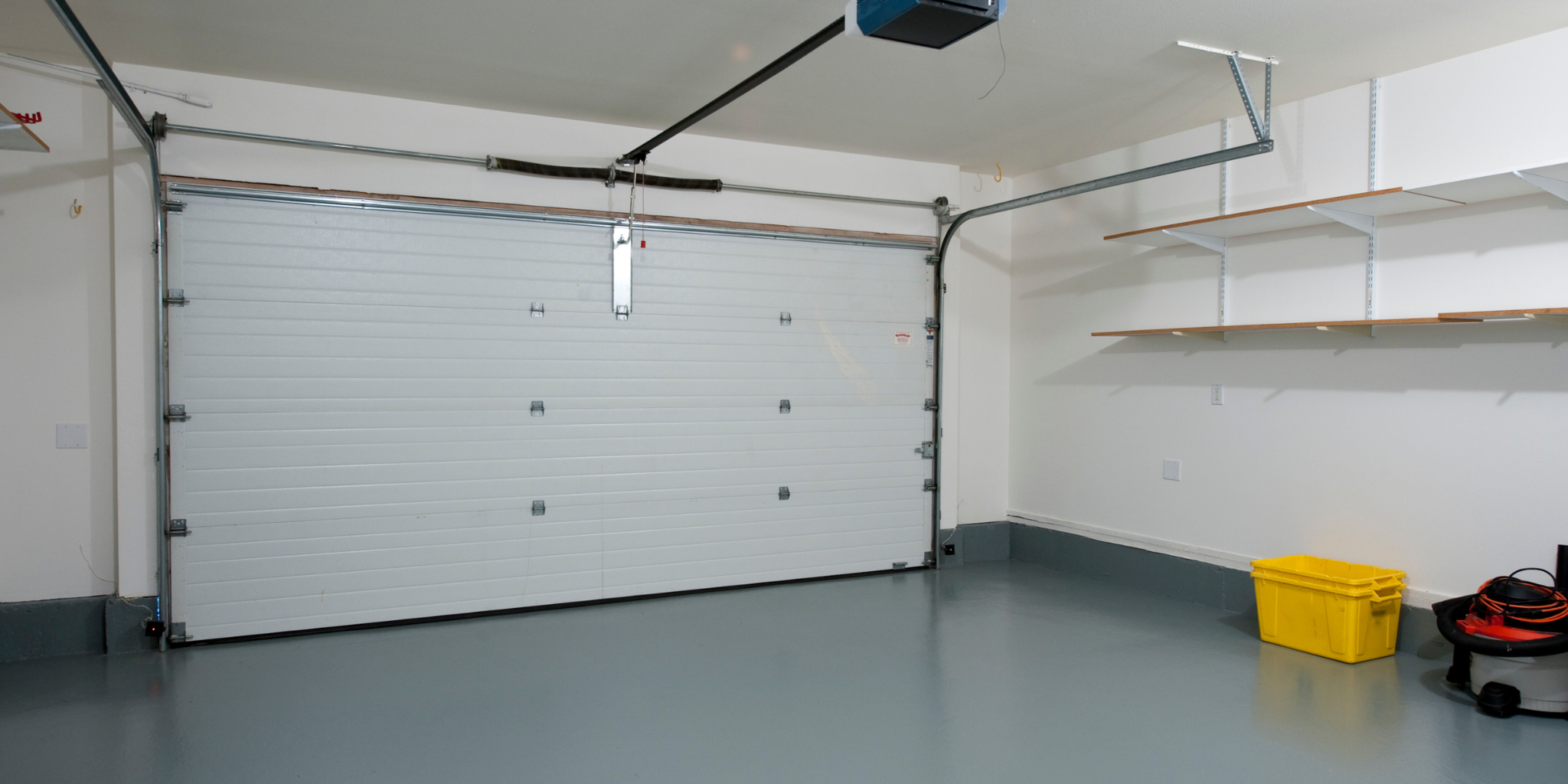 Epoxy concrete flooring in garage with durable and seamless finish