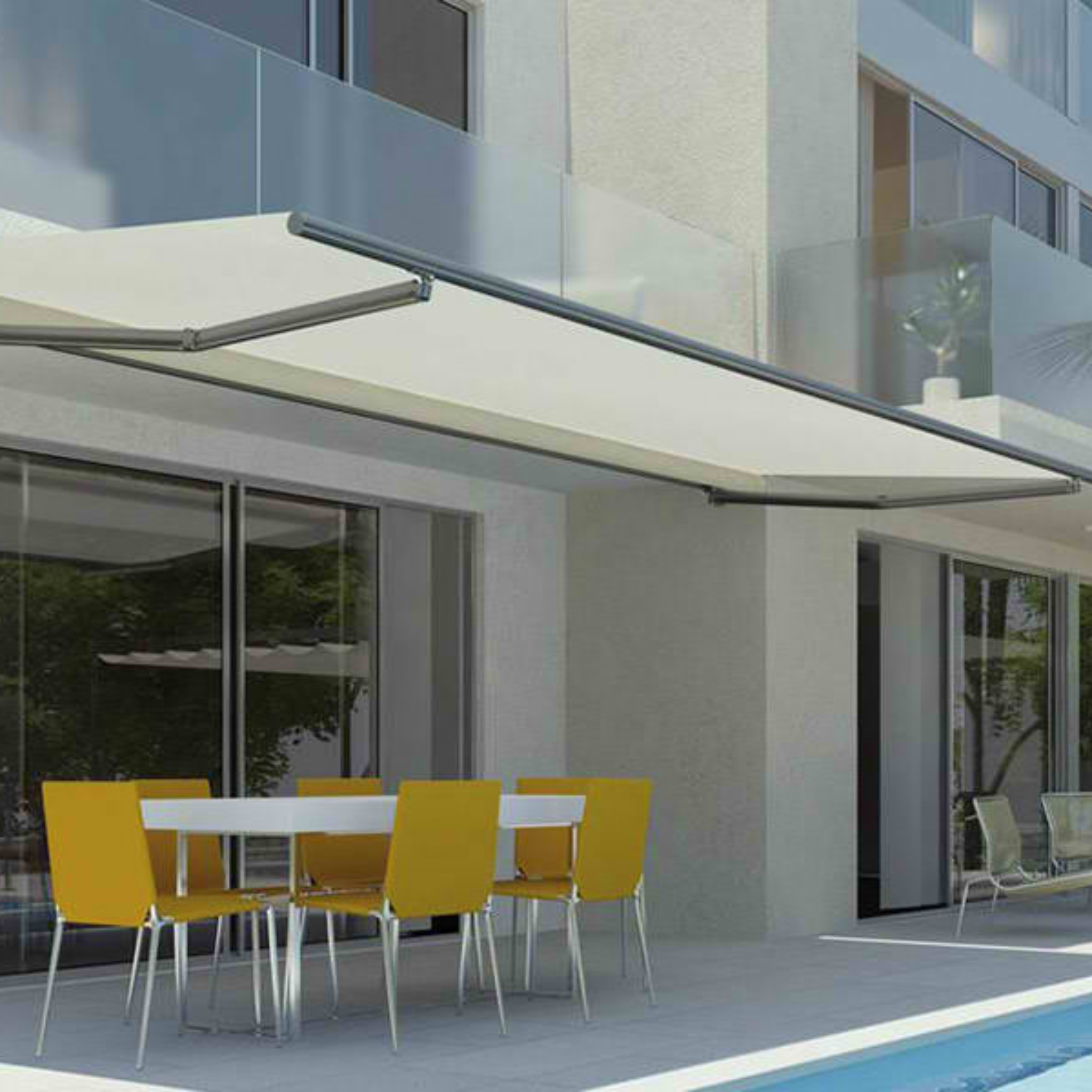 Folding arm awnings extending over outdoor area for flexible shade coverage