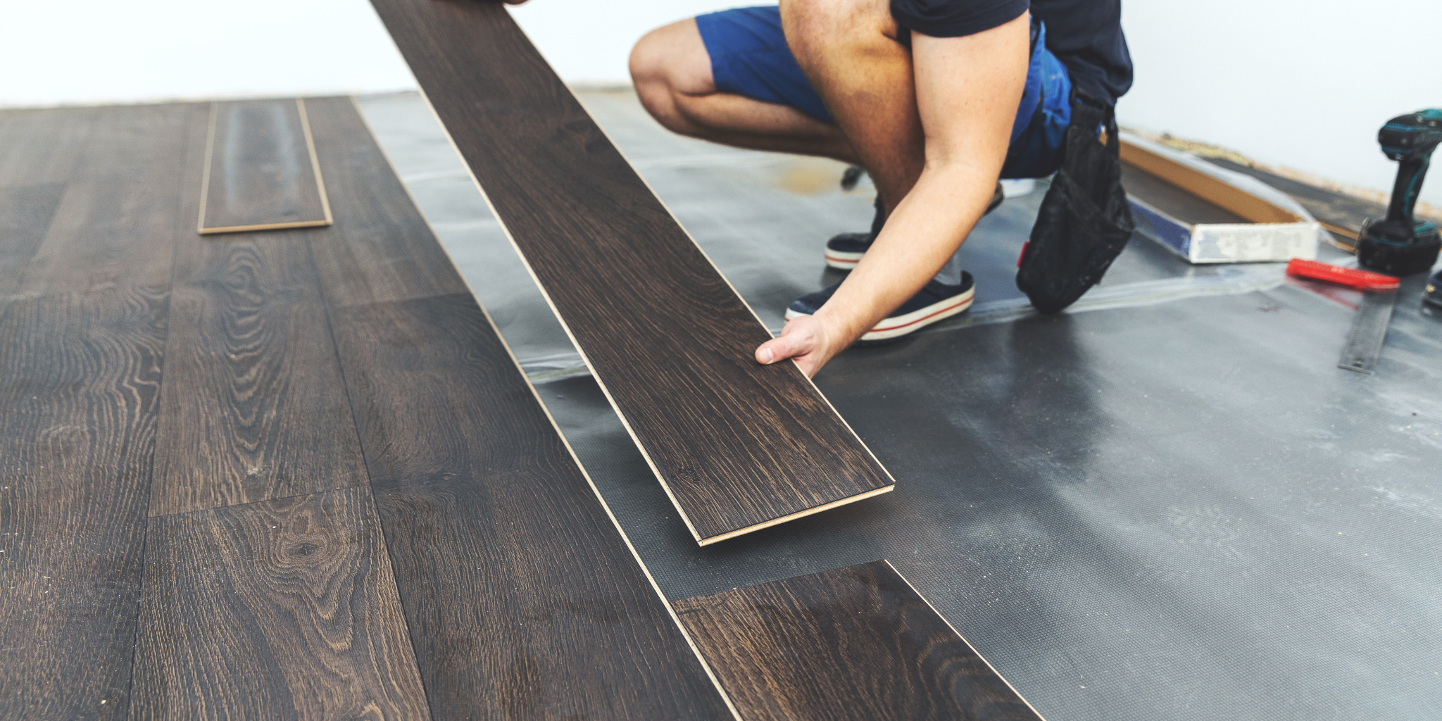 Vinyl plank flooring installation in progress for durable interior surface