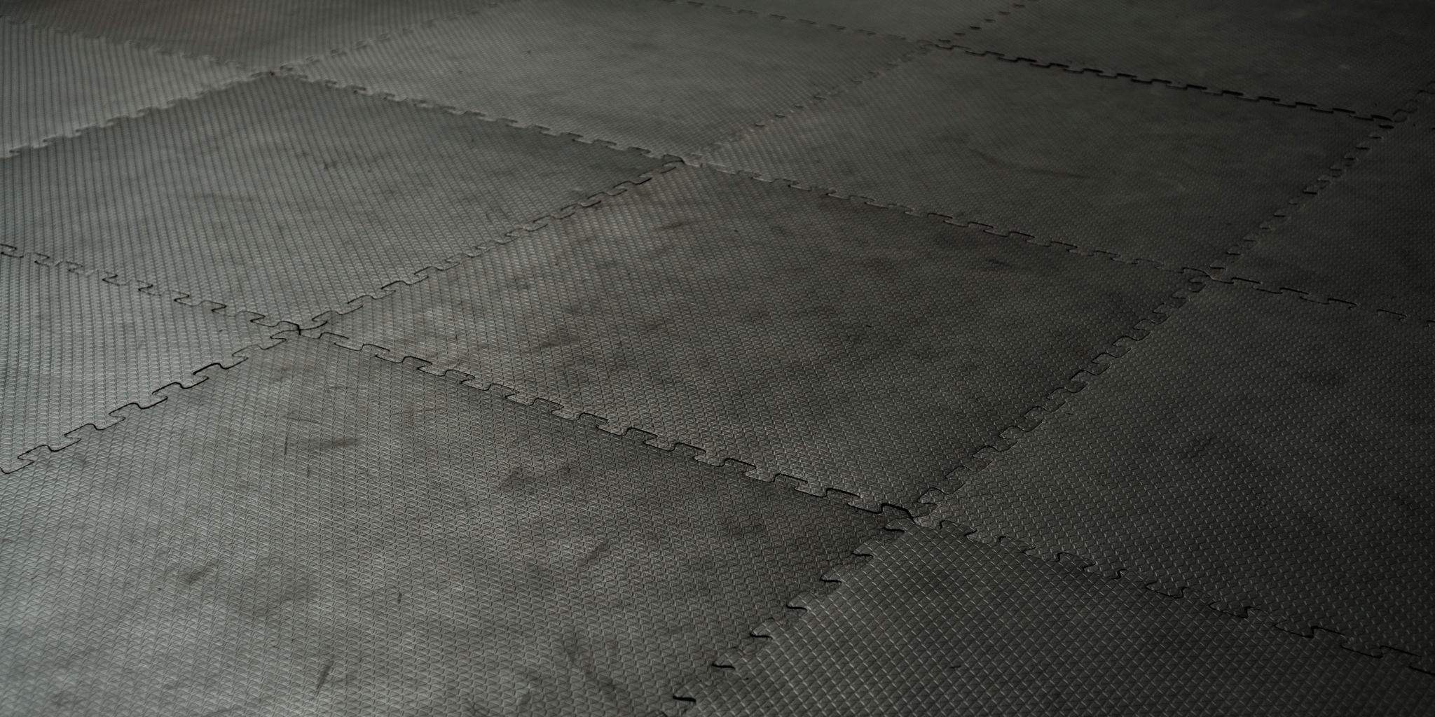 Rubber flooring surface with textured finish for safety and durability