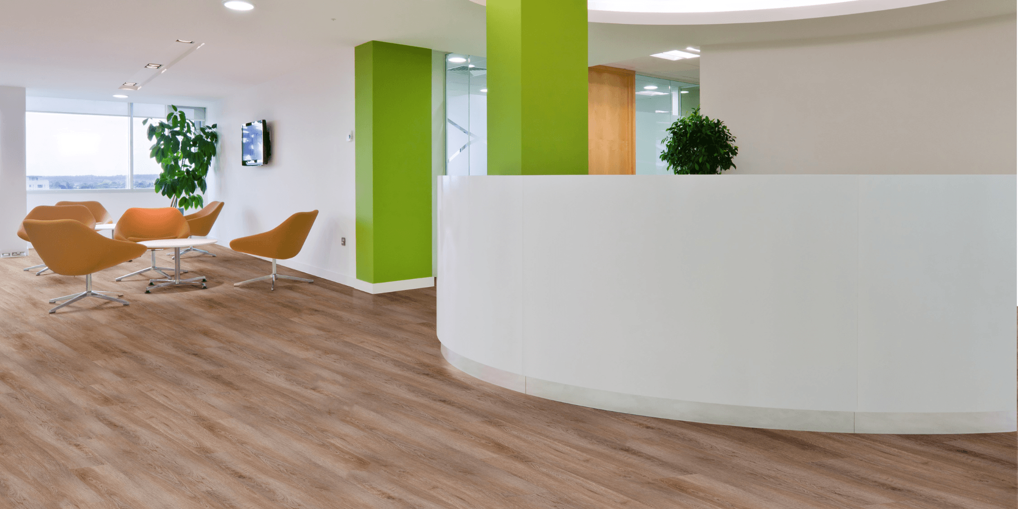 Hybrid flooring installed in reception area for durable and modern finish